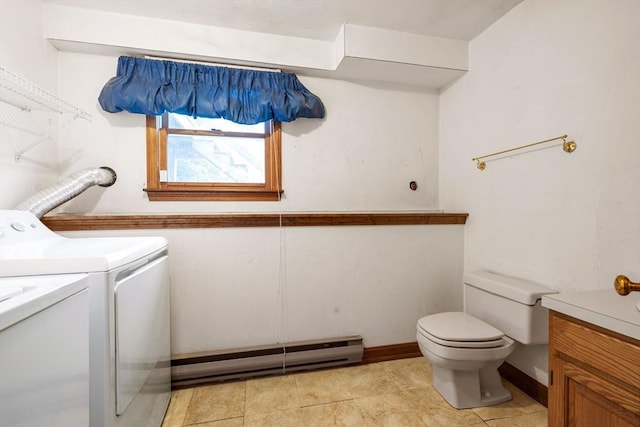 18 Bismark St, Dedham, MA 02026 - laundry area featuring washing machine and clothes dryer, a baseboard radiator, and light tile patterned flooring