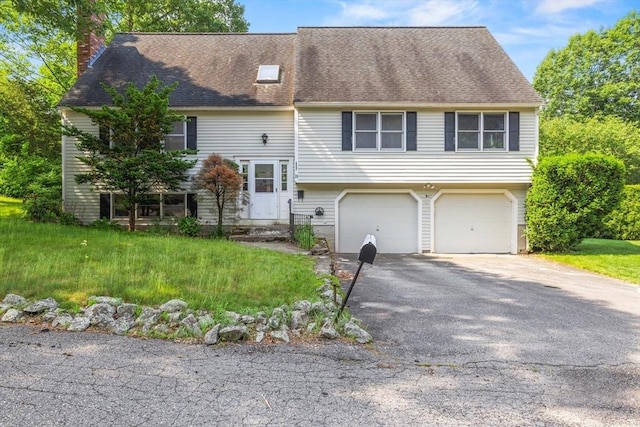 18 Bismark St, Dedham, MA 02026 - split foyer home with a chimney, an attached garage, driveway, and a shingled roof