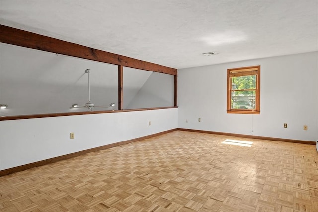 18 Bismark St, Dedham, MA 02026 - spare room with baseboards and ceiling fan
