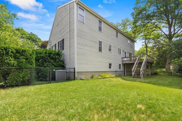 18 Bismark St, Dedham, MA 02026 - back of house with stairs and a wooden deck