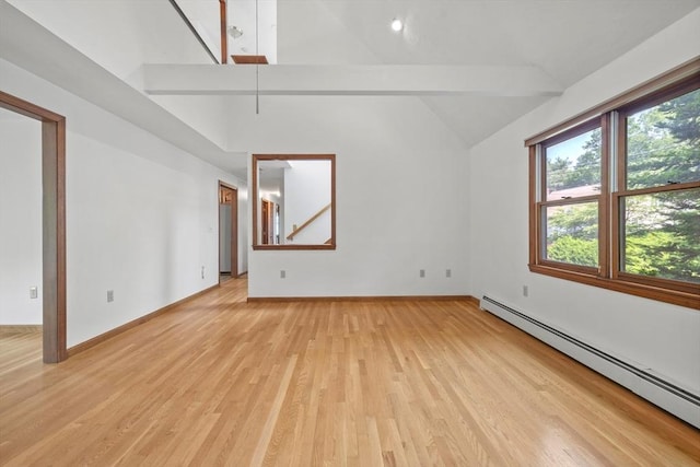 18 Bismark St, Dedham, MA 02026 - unfurnished room with a baseboard radiator, light wood finished floors, and high vaulted ceiling