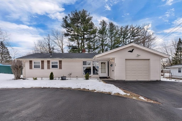 single story home with a garage