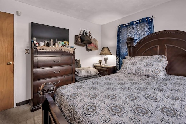 bedroom with light colored carpet