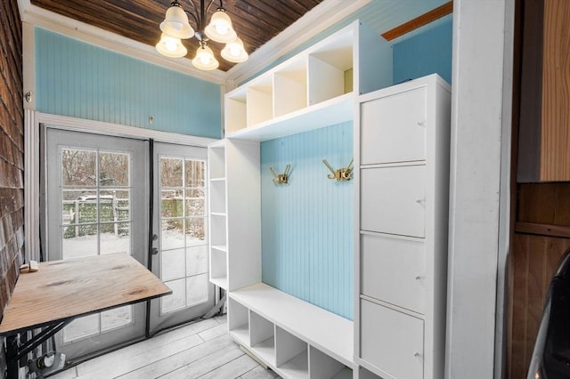 mudroom featuring wood-type flooring, a notable chandelier, and wood ceiling