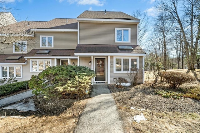 view of front of home with roof with shingles