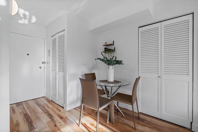 dining room with light wood-type flooring