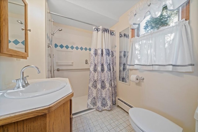 bathroom featuring vanity, toilet, tile patterned floors, a baseboard radiator, and a stall shower