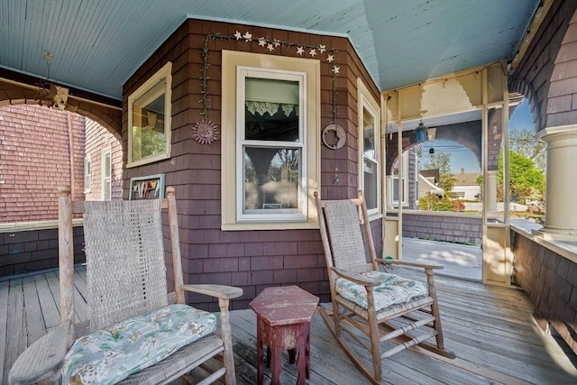 deck with covered porch