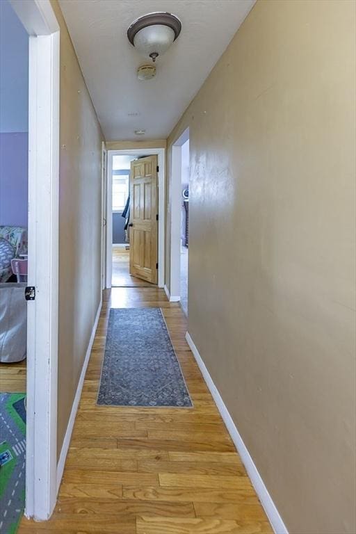 24 Curve St, Brockton, MA 02302 - hallway with wood finished floors and baseboards