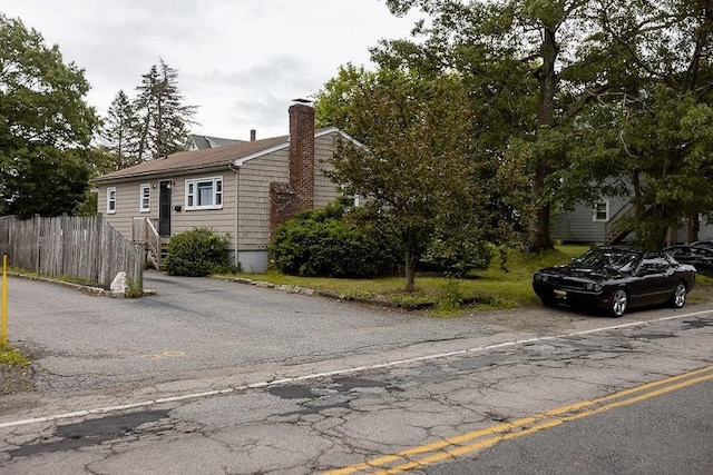 24 Curve St, Brockton, MA 02302 - view of front of home featuring a chimney