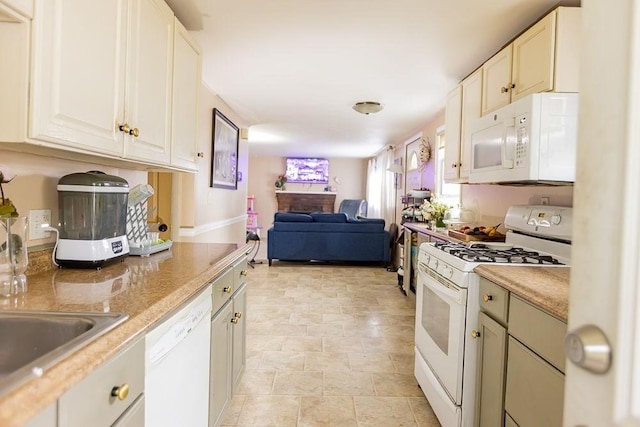 24 Curve St, Brockton, MA 02302 - kitchen with white appliances, open floor plan, light countertops, and stone finish flooring