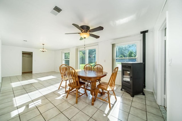 35 Lazywood Ln, Swansea, MA 02777 - dining area with light tile patterned flooring, a chandelier, and a ceiling fan