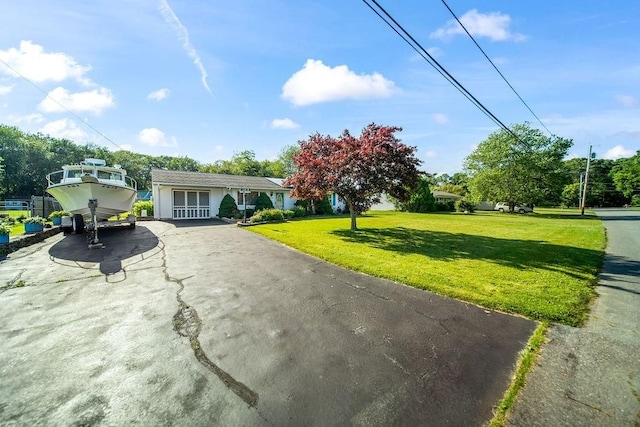 35 Lazywood Ln, Swansea, MA 02777 - view of front of property with a front lawn and driveway