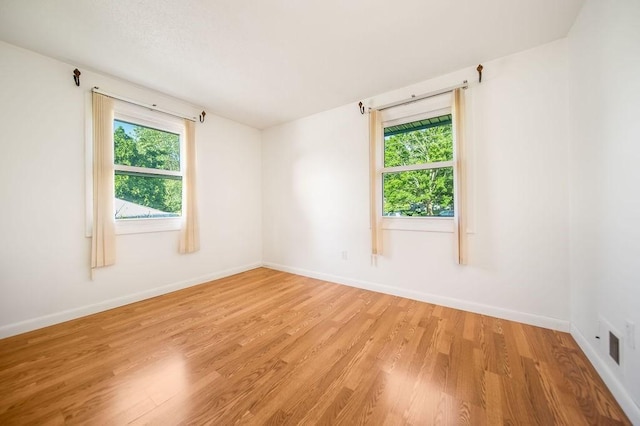 35 Lazywood Ln, Swansea, MA 02777 - empty room with light wood finished floors and baseboards