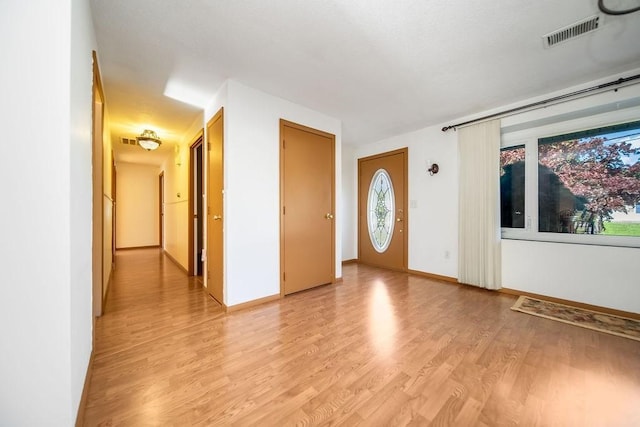 35 Lazywood Ln, Swansea, MA 02777 - entryway with light wood finished floors and baseboards