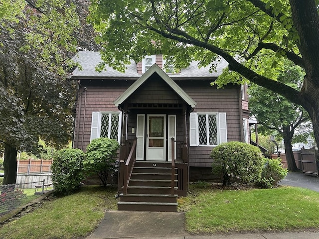 54 Brunswick Park, Melrose, MA 02176 - view of front of property featuring roof with shingles