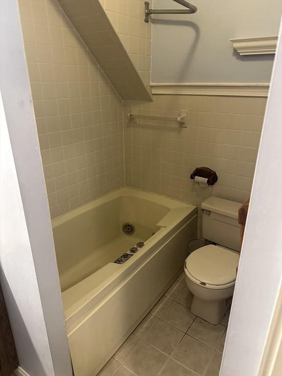 54 Brunswick Park, Melrose, MA 02176 - full bathroom featuring toilet, tile patterned flooring, tile walls, and  shower combination