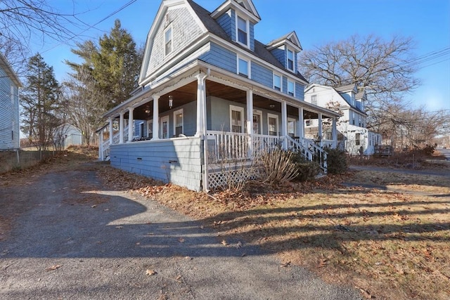 farmhouse with covered porch