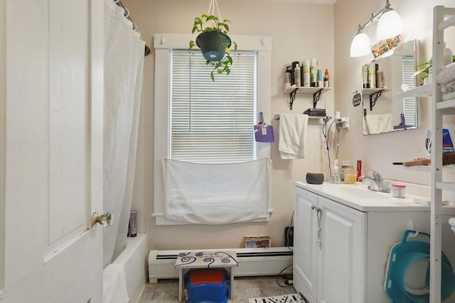 bathroom with vanity and shower / bath combination with curtain