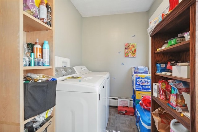 laundry room with washing machine and dryer, a baseboard radiator, and dark parquet floors