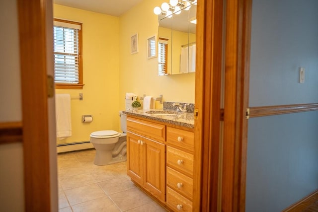 full bath featuring baseboard heating, toilet, tile patterned flooring, and vanity