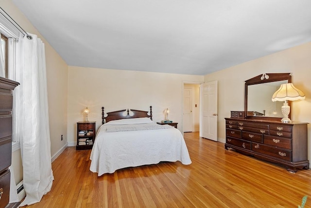 bedroom with wood-type flooring