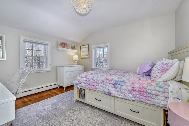 bedroom featuring multiple windows, lofted ceiling, baseboard heating, and light hardwood / wood-style floors