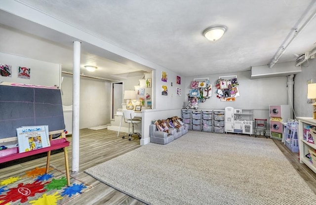 game room featuring hardwood / wood-style flooring