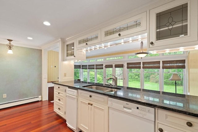 14 Prince St, Danvers, MA 01923 - kitchen with dishwasher, a sink, ornamental molding, glass insert cabinets, and dark stone counters