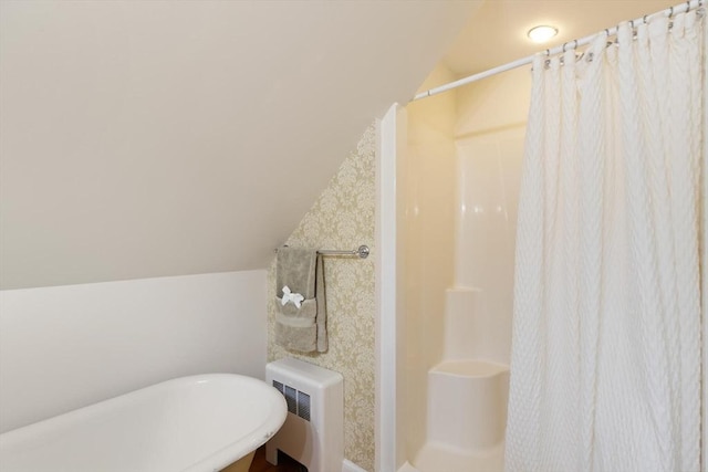 14 Prince St, Danvers, MA 01923 - bathroom featuring wallpapered walls, vaulted ceiling, curtained shower, a freestanding bath, and radiator heating unit