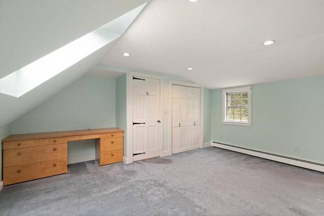14 Prince St, Danvers, MA 01923 - bonus room featuring a skylight, vaulted ceiling, baseboard heating, carpet flooring, and recessed lighting