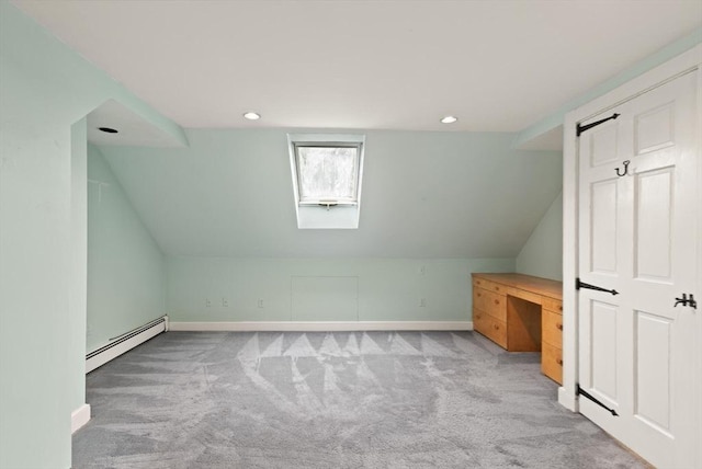 14 Prince St, Danvers, MA 01923 - additional living space with a baseboard heating unit, baseboards, carpet floors, a skylight, and lofted ceiling