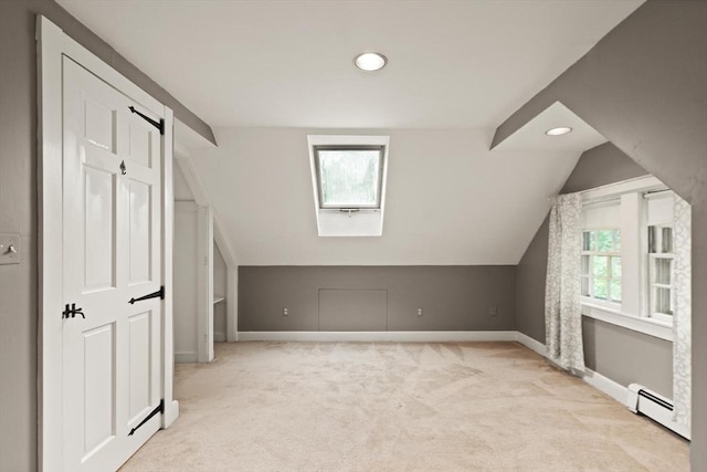 14 Prince St, Danvers, MA 01923 - additional living space with a baseboard heating unit, a skylight, carpet floors, recessed lighting, and baseboards