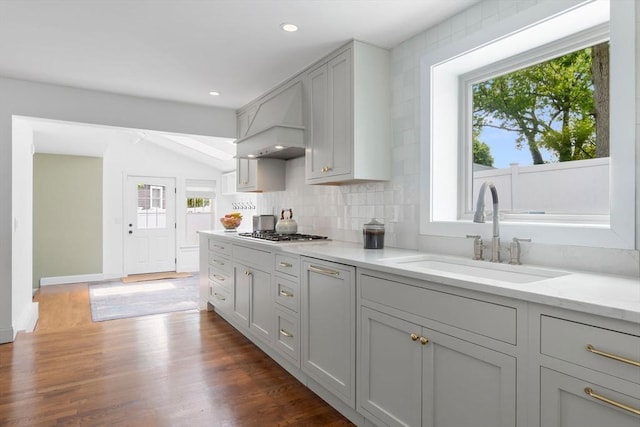 71 Sheffield Rd, Melrose, MA 02176 - kitchen with a sink, plenty of natural light, custom range hood, gas cooktop, and recessed lighting