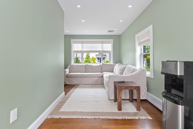 71 Sheffield Rd, Melrose, MA 02176 - living room featuring wood finished floors, baseboards, and recessed lighting