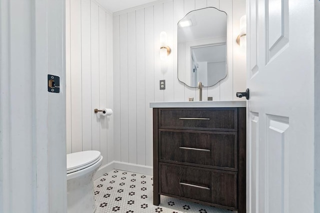 71 Sheffield Rd, Melrose, MA 02176 - bathroom featuring toilet, vanity, and baseboards