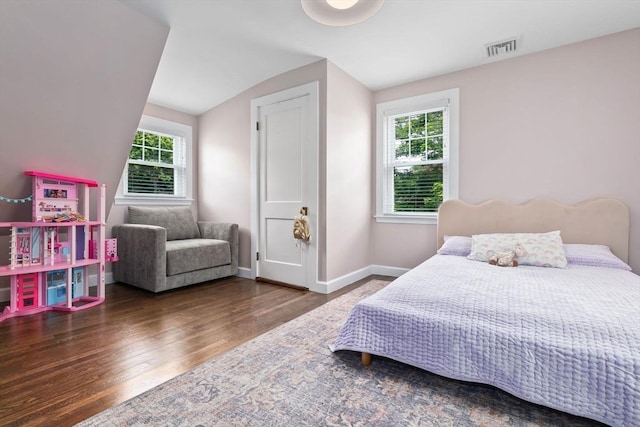 71 Sheffield Rd, Melrose, MA 02176 - bedroom with wood finished floors, lofted ceiling, and baseboards