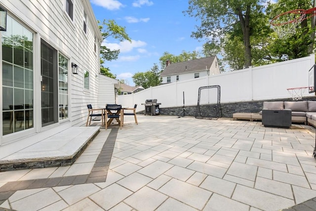 71 Sheffield Rd, Melrose, MA 02176 - fenced backyard featuring outdoor dining area, a patio area, grilling area, and an outdoor living space