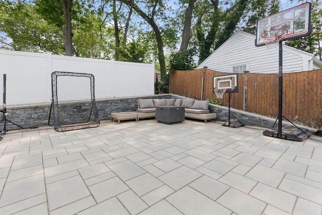71 Sheffield Rd, Melrose, MA 02176 - fenced backyard with an outdoor hangout area and a patio