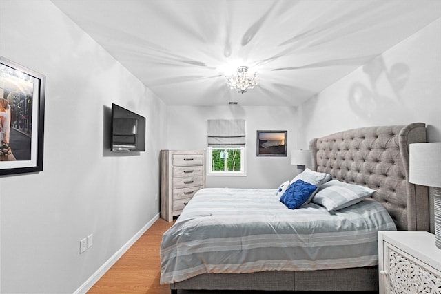 bedroom featuring hardwood / wood-style floors