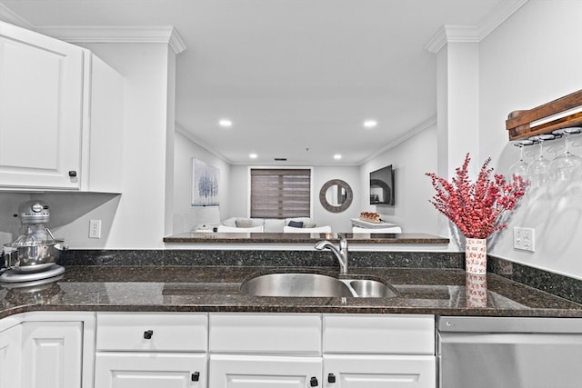 kitchen with sink, dishwasher, dark stone counters, white cabinets, and crown molding