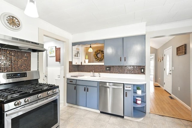 kitchen with backsplash, open shelves, appliances with stainless steel finishes, and under cabinet range hood