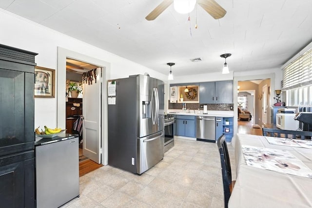 kitchen featuring ceiling fan, backsplash, open shelves, light countertops, and stainless steel appliances