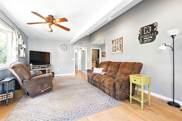 living room featuring recessed lighting, ceiling fan, baseboards, and light wood-type flooring