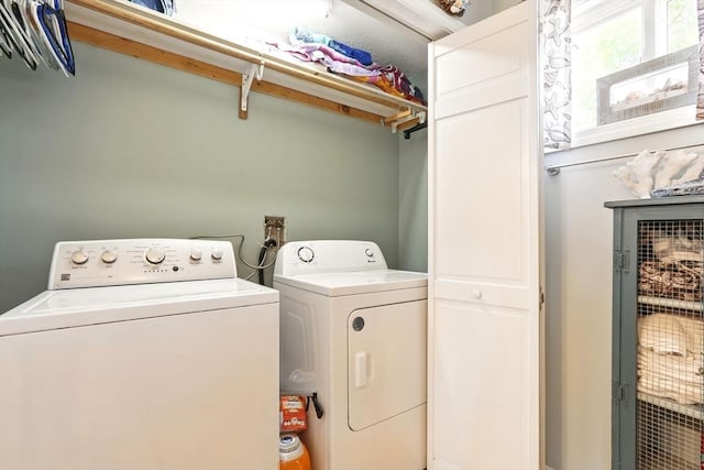 laundry area with laundry area and washer and dryer