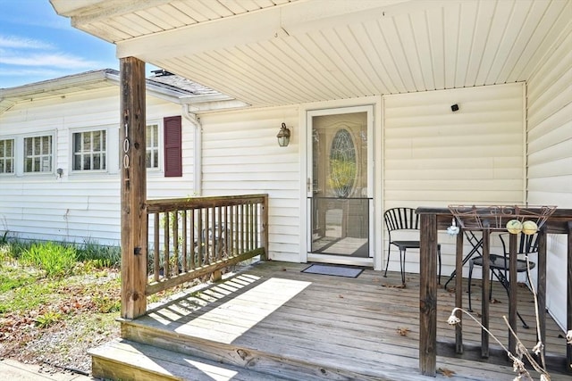 deck featuring outdoor dining area