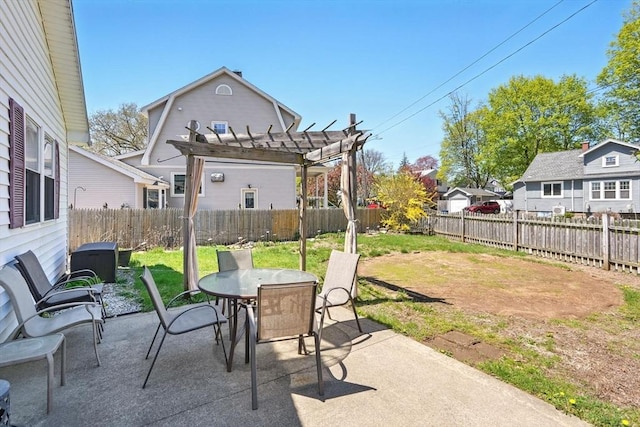 view of patio with outdoor dining area, a fenced backyard, and a pergola