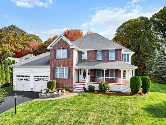 6 Hutchins Way, Westford, MA 01886 - view of front of property with covered porch, driveway, a garage, a front lawn, and roof with shingles