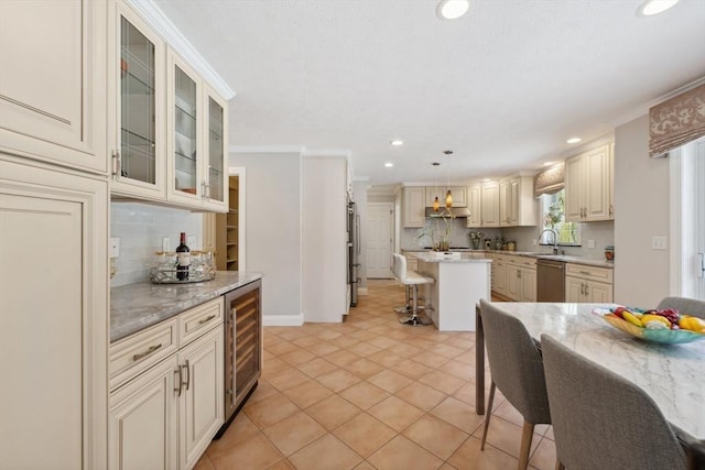6 Hutchins Way, Westford, MA 01886 - kitchen featuring stainless steel appliances, a sink, wine cooler, recessed lighting, and cream cabinets