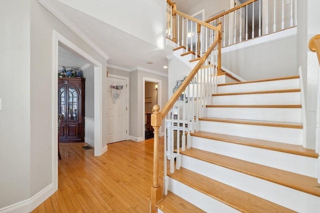 6 Hutchins Way, Westford, MA 01886 - stairway with hardwood / wood-style floors, ornamental molding, and baseboards